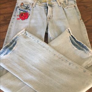 Miss Me Jeans with peace embroidery.